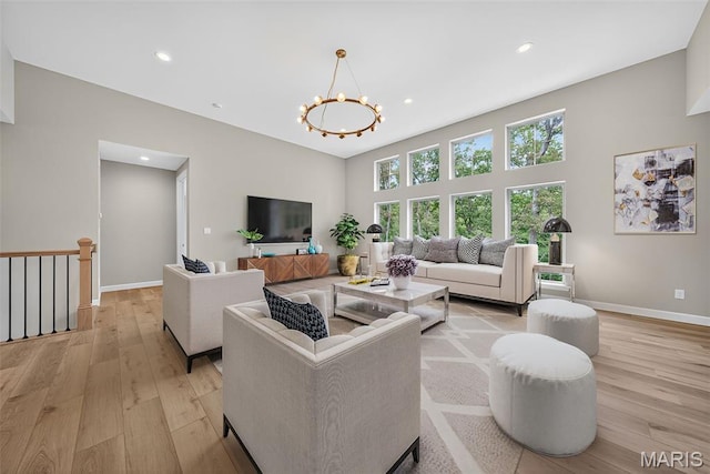 212 Terradel Trl, Foristell, MO 63348 - living area with light wood-style floors, recessed lighting, and a chandelier