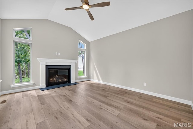 212 Terradel Trl, Foristell, MO 63348 - unfurnished living room featuring ceiling fan, healthy amount of natural light, light wood-style flooring, and vaulted ceiling
