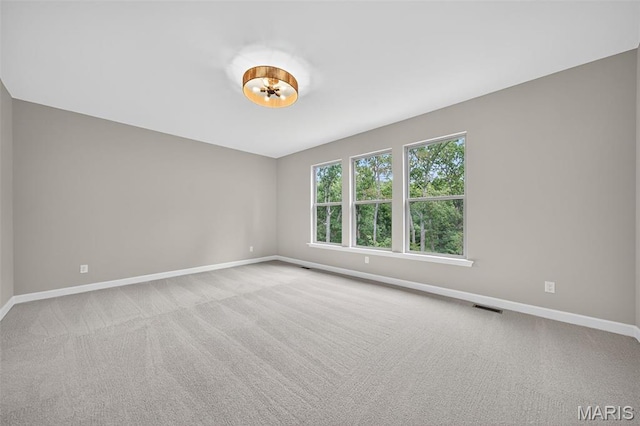 212 Terradel Trl, Foristell, MO 63348 - spare room with baseboards and carpet
