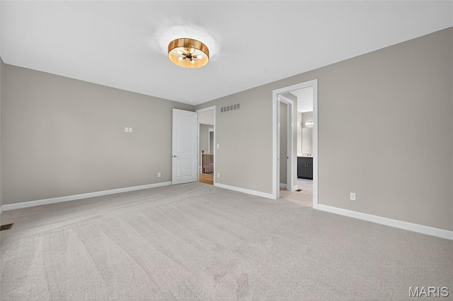 212 Terradel Trl, Foristell, MO 63348 - unfurnished bedroom featuring light colored carpet and connected bathroom