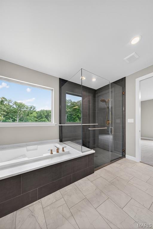 212 Terradel Trl, Foristell, MO 63348 - bathroom with marble finish floors, a garden tub, recessed lighting, and a stall shower