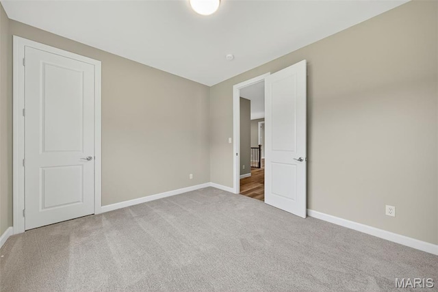 212 Terradel Trl, Foristell, MO 63348 - unfurnished bedroom with baseboards and carpet floors