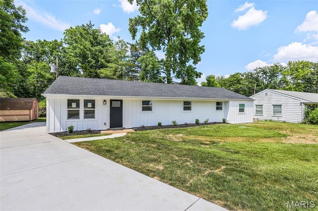 715 Westchester Ct, Kirkwood, MO 63122 - ranch-style home with a front yard, board and batten siding, a shed, and a shingled roof