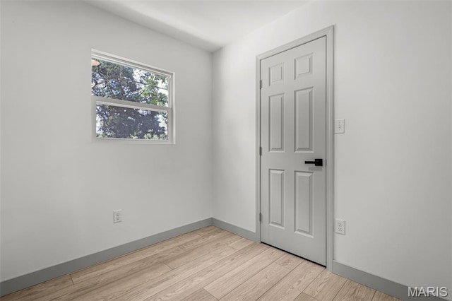 715 Westchester Ct, Kirkwood, MO 63122 - empty room featuring light wood-type flooring and baseboards