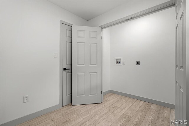 715 Westchester Ct, Kirkwood, MO 63122 - laundry area featuring hookup for an electric dryer, light wood-style flooring, and hookup for a washing machine