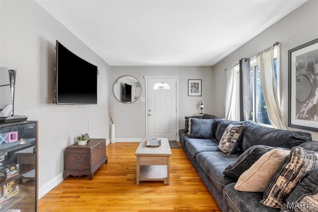 1164 Ursula Ave, University City, MO 63130 - living room featuring light wood-style floors and baseboards