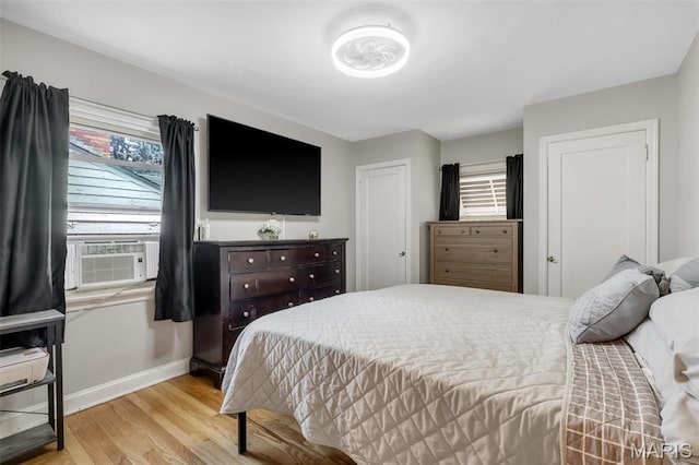 1164 Ursula Ave, University City, MO 63130 - bedroom with wood finished floors and cooling unit