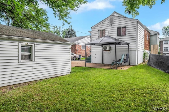 1164 Ursula Ave, University City, MO 63130 - back of house with a gazebo, a patio, and an outdoor structure