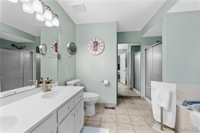 391 Carriage Trail Ct, Ofallon, MO 63368 - bathroom with a stall shower, double vanity, a bath, and tile patterned flooring