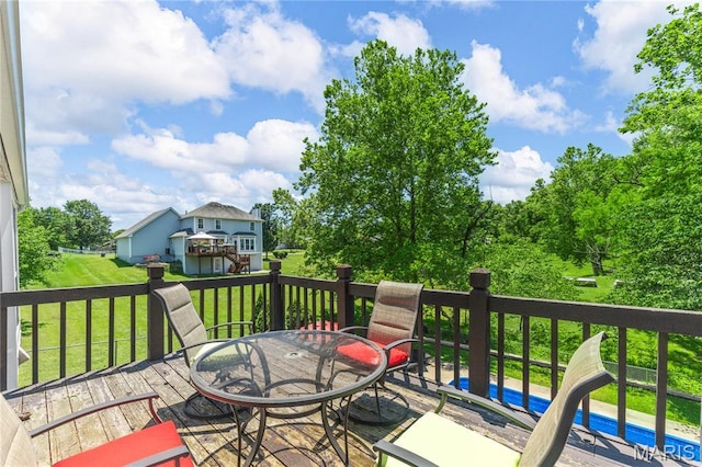 391 Carriage Trail Ct, Ofallon, MO 63368 - wooden terrace featuring a lawn