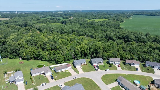 111 Rivers Edge Dr, Moscow Mills, MO 63362 - aerial overview of property's location with a forest and nearby suburban area