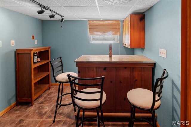 1110 Logan St, Alton, IL 62002 - indoor dry bar featuring baseboards and a drop ceiling