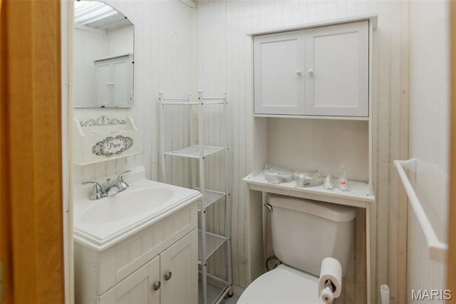 1110 Logan St, Alton, IL 62002 - half bathroom featuring vanity and toilet