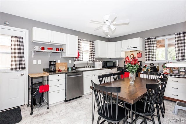 314 Weber Dr, Eureka, MO 63025 - kitchen with dishwasher, black microwave, white cabinets, a ceiling fan, and under cabinet range hood