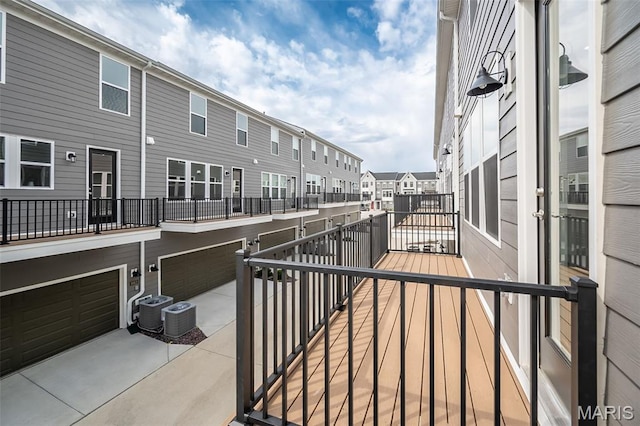 8915 E Gateway Hts Unit 94-803, Richmond Heights, MO 63144 - patio / terrace featuring a residential view and an attached garage