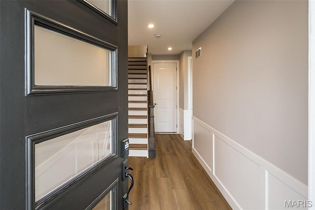 8915 E Gateway Hts Unit 94-803, Richmond Heights, MO 63144 - corridor featuring wood finished floors, recessed lighting, wainscoting, and stairs