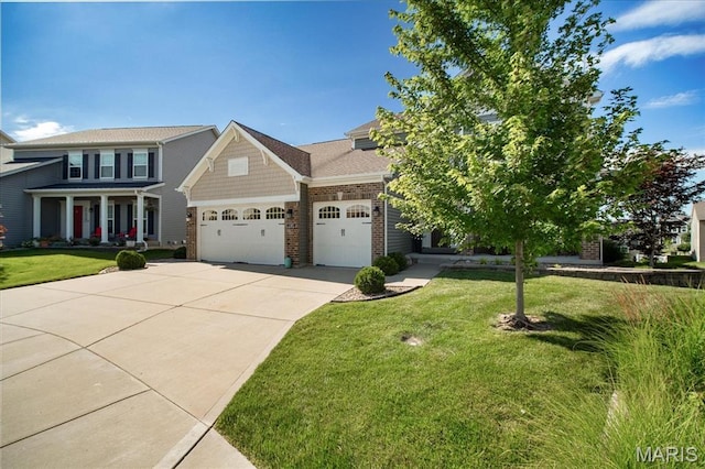 2385 Chemin Ave, Saint Charles, MO 63301 - view of front of property with an attached garage, driveway, brick siding, and a front yard