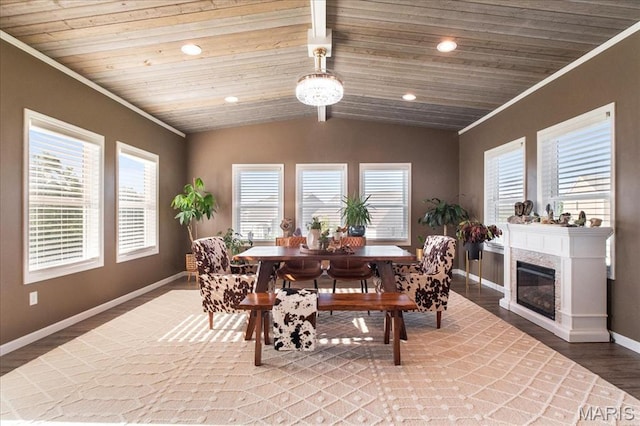 2385 Chemin Ave, Saint Charles, MO 63301 - dining space featuring wood finished floors, crown molding, lofted ceiling, wooden ceiling, and a glass covered fireplace