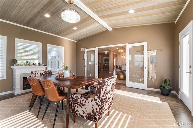 2385 Chemin Ave, Saint Charles, MO 63301 - dining room featuring a chandelier, wood finished floors, ornamental molding, vaulted ceiling, and french doors