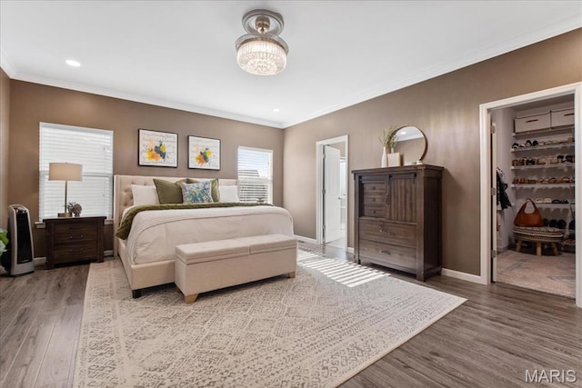 2385 Chemin Ave, Saint Charles, MO 63301 - bedroom with ornamental molding, wood finished floors, recessed lighting, and a spacious closet