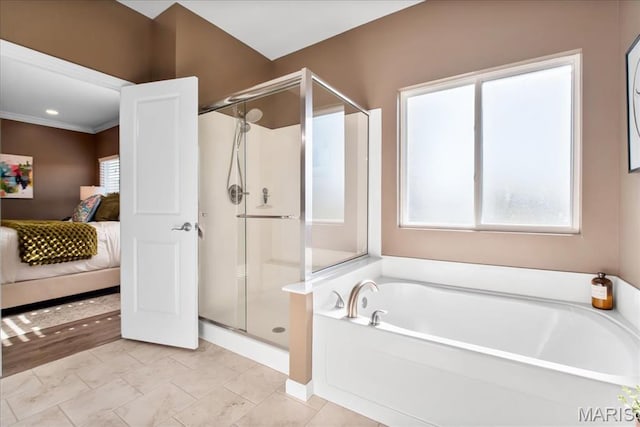 2385 Chemin Ave, Saint Charles, MO 63301 - full bath featuring plenty of natural light, a stall shower, a garden tub, and ensuite bath