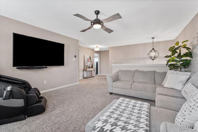 2385 Chemin Ave, Saint Charles, MO 63301 - carpeted living area featuring ceiling fan and a chandelier