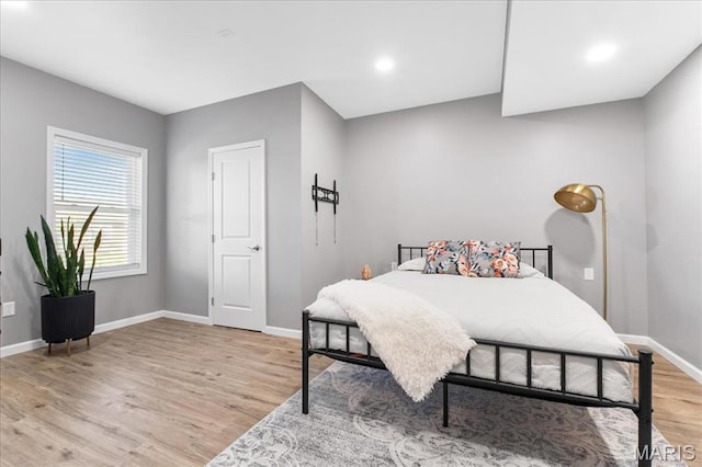 2385 Chemin Ave, Saint Charles, MO 63301 - bedroom with light wood-style flooring and baseboards