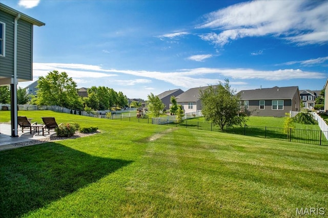 2385 Chemin Ave, Saint Charles, MO 63301 - fenced backyard with a patio area and a residential view