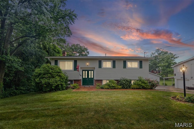 3200 Ridgeway Ave, Godfrey, IL 62035 - bi-level home featuring a chimney and a lawn