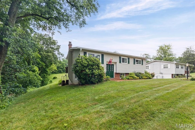 3200 Ridgeway Ave, Godfrey, IL 62035 - split foyer home with a chimney and a front yard