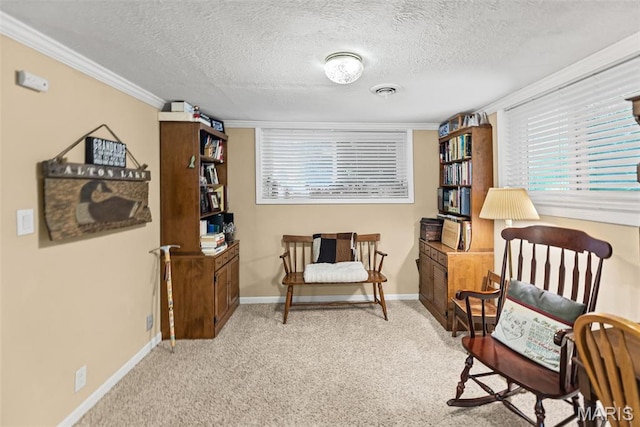 3200 Ridgeway Ave, Godfrey, IL 62035 - sitting room featuring light colored carpet, crown molding, and a textured ceiling