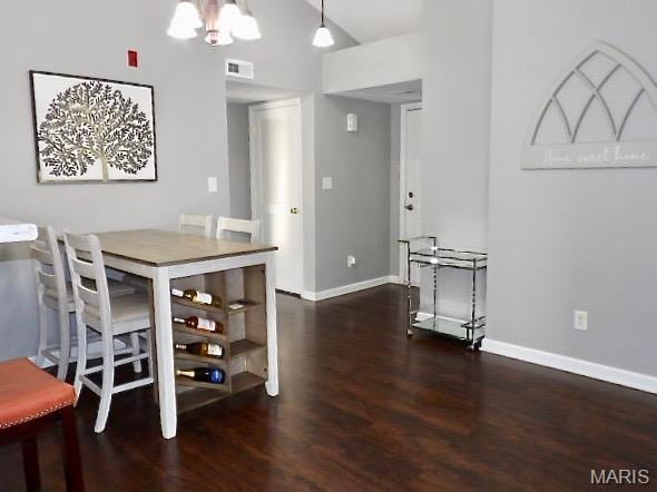 7302 Spring Creek Ln, Ofallon, MO 63368 - dining area featuring wood finished floors and a chandelier