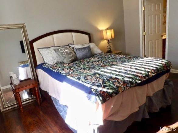7302 Spring Creek Ln, Ofallon, MO 63368 - bedroom with wood finished floors