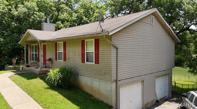 176 Briarwood Ter, De Soto, MO 63020 - view of front of property with an attached garage and a chimney