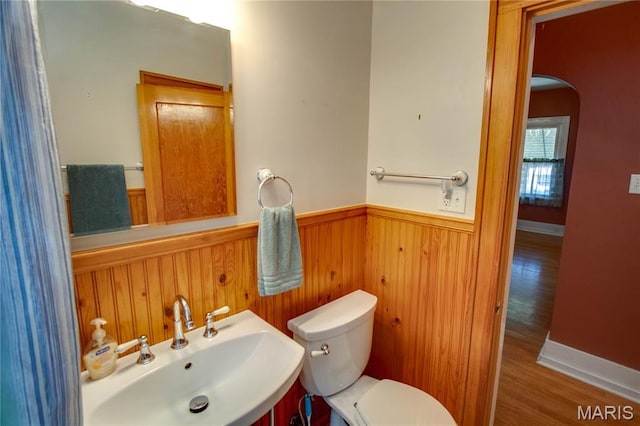 301 E 7th St, Alton, IL 62002 - half bathroom with a wainscoted wall, wood finished floors, and wood walls