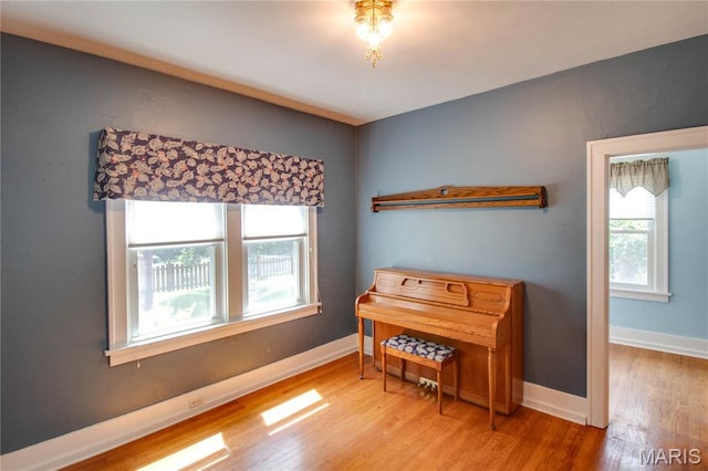 301 E 7th St, Alton, IL 62002 - living area featuring plenty of natural light and wood finished floors
