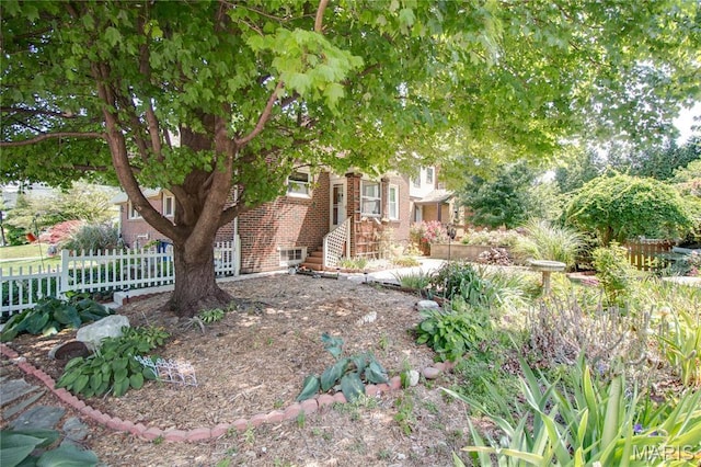 301 E 7th St, Alton, IL 62002 - view of property hidden behind natural elements featuring brick siding