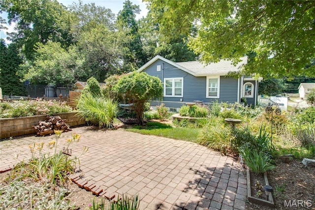 301 E 7th St, Alton, IL 62002 - view of front of home with a patio area