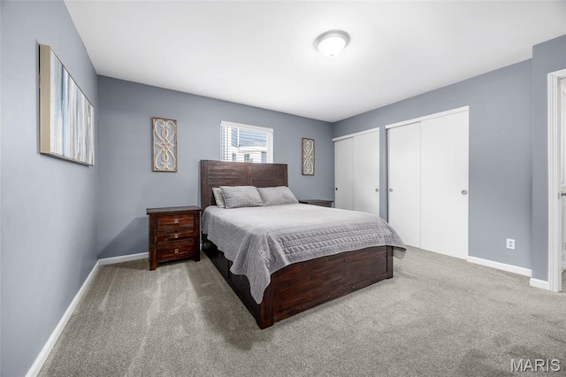 33 Kingspointe Dr, Saint Peters, MO 63376 - bedroom with multiple closets and carpet flooring