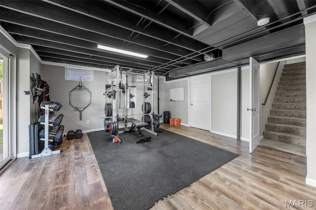 33 Kingspointe Dr, Saint Peters, MO 63376 - workout area with wood finished floors and baseboards