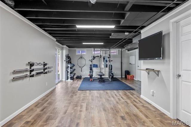 33 Kingspointe Dr, Saint Peters, MO 63376 - exercise area featuring wood finished floors and baseboards