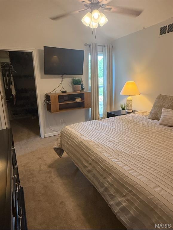 24 Lantern Ln, Lake St Louis, MO 63367 - carpeted bedroom with a spacious closet, a closet, and ceiling fan