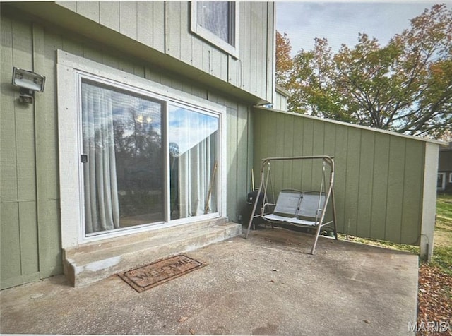 24 Lantern Ln, Lake St Louis, MO 63367 - doorway to property featuring a patio area