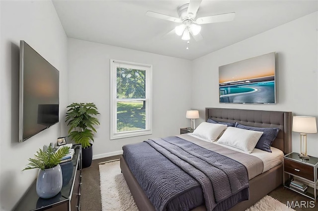 5265 Country Club Rd, Washington, MO 63090 - carpeted bedroom with baseboards and ceiling fan