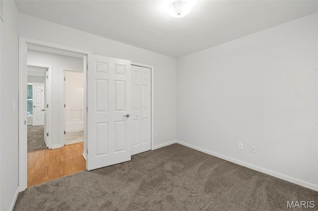 5265 Country Club Rd, Washington, MO 63090 - unfurnished bedroom featuring carpet and a closet