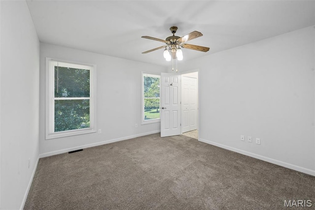 5265 Country Club Rd, Washington, MO 63090 - carpeted empty room with ceiling fan and baseboards