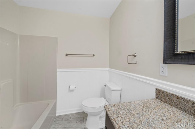 5265 Country Club Rd, Washington, MO 63090 - bathroom with wainscoting, vanity, and marble finish flooring