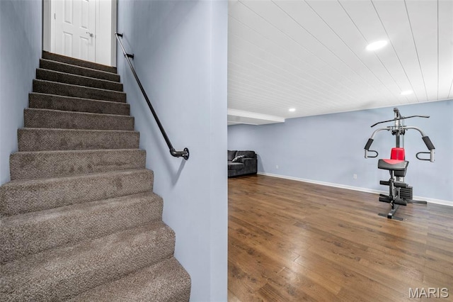 5265 Country Club Rd, Washington, MO 63090 - staircase featuring wood finished floors and recessed lighting