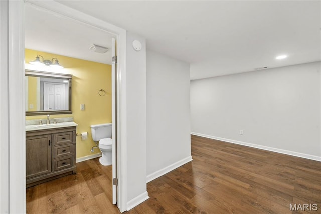 5265 Country Club Rd, Washington, MO 63090 - bathroom featuring vanity and wood finished floors