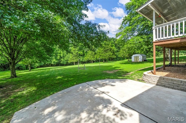 5265 Country Club Rd, Washington, MO 63090 - view of green lawn with a storage shed, a patio, and a deck